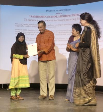 Rafika receiving her award at the Samiksha Scholarships Program in January 2019